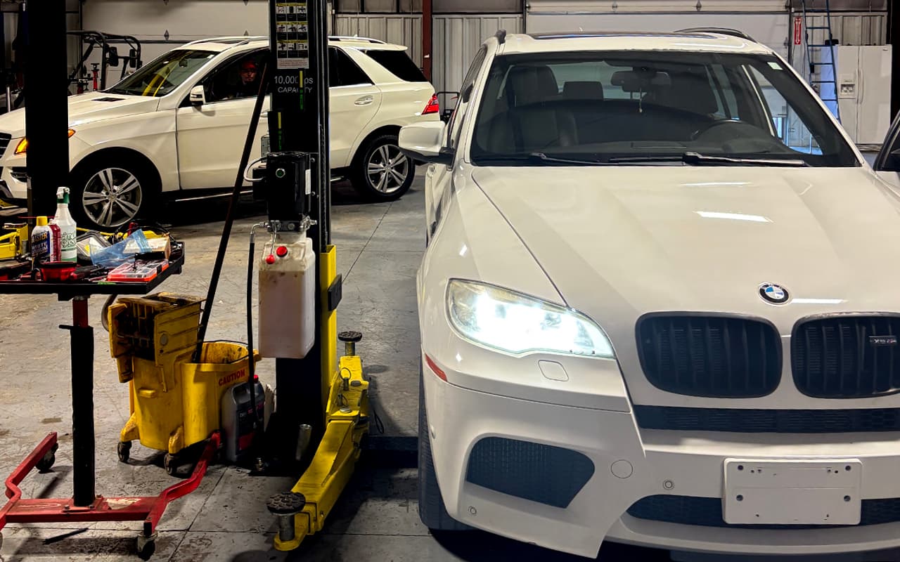 BMW in the Impact Auto Repair service bay